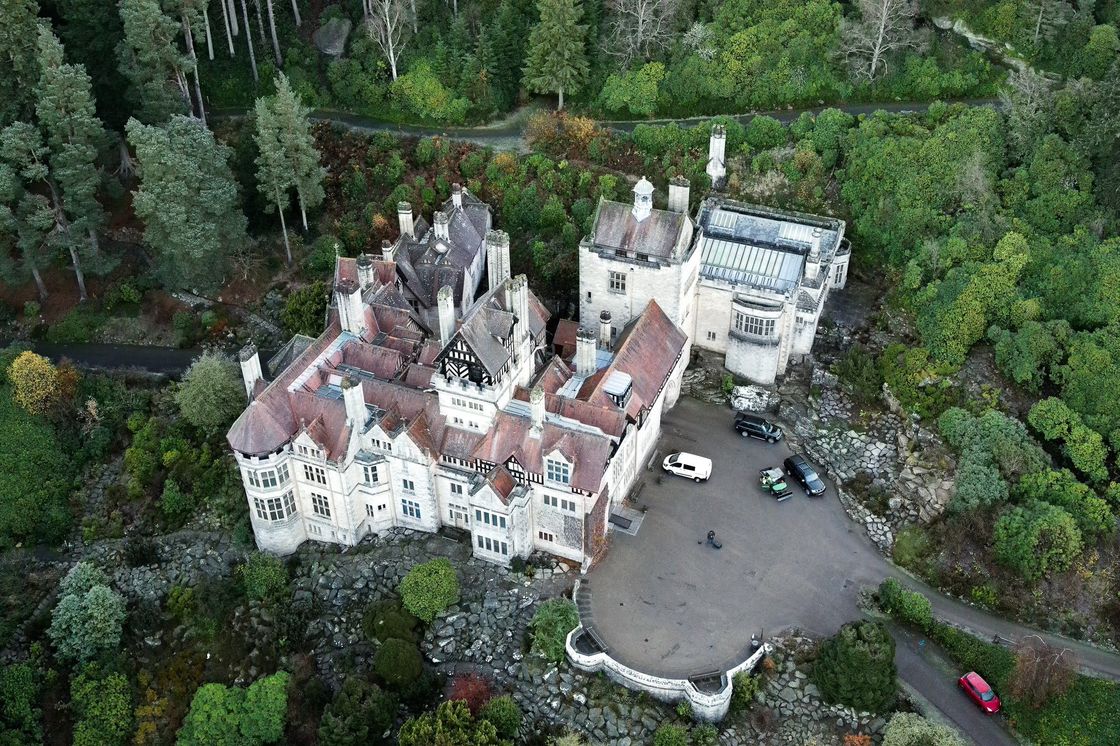 Drone surveying mansion grounds
